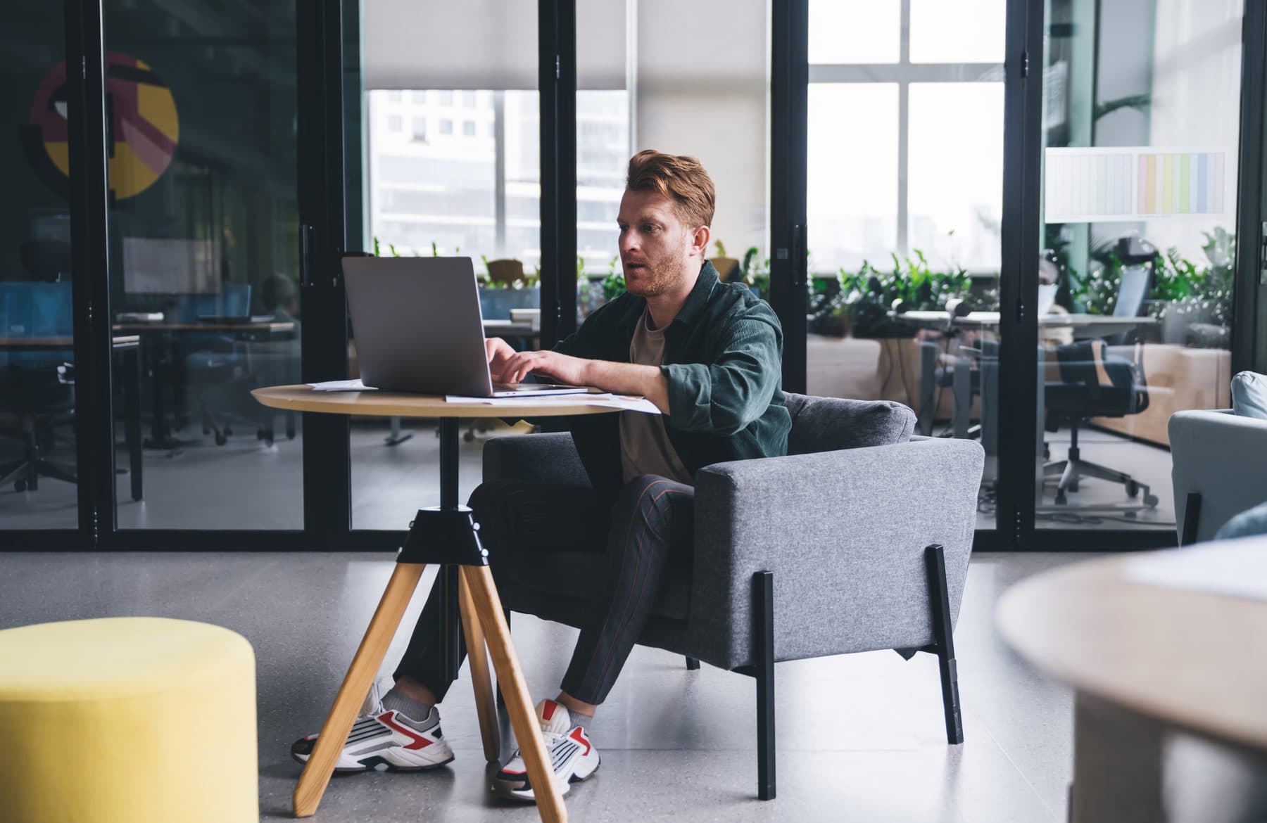 Hyvenna team member working in a modern office